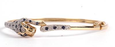 Lot 194 - Modern 9ct gold panther hinged bracelet, the...