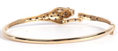 Lot 194 - Modern 9ct gold panther hinged bracelet, the...