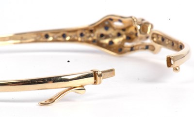 Lot 194 - Modern 9ct gold panther hinged bracelet, the...