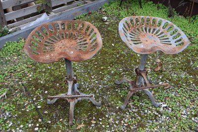 Lot 3 - Pair of cast iron bar stools, height approx 65cm