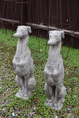 Lot 12 - Pair of seated whippets, height 75cm