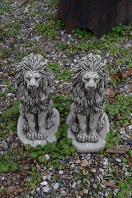 Lot 17 - Pair of composite seated lions, height approx...