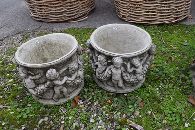 Lot 18 - Pair of decorative composite garden plant pots,...