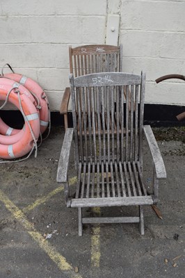 Lot 52 - Two teak garden chairs