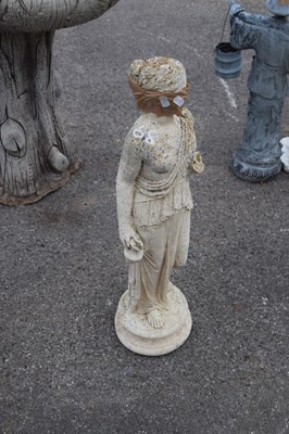 Lot 68 - Composite garden statue modelled as a woman...