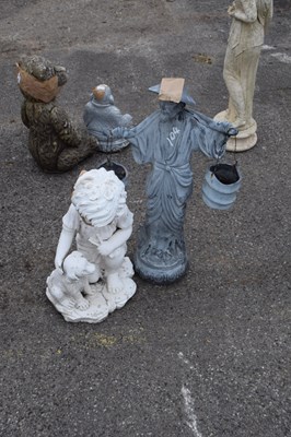 Lot 104 - Two resin statues, height 60cm