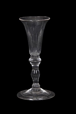 Lot 38 - 18th Century wine glass, the bell bowl above a...