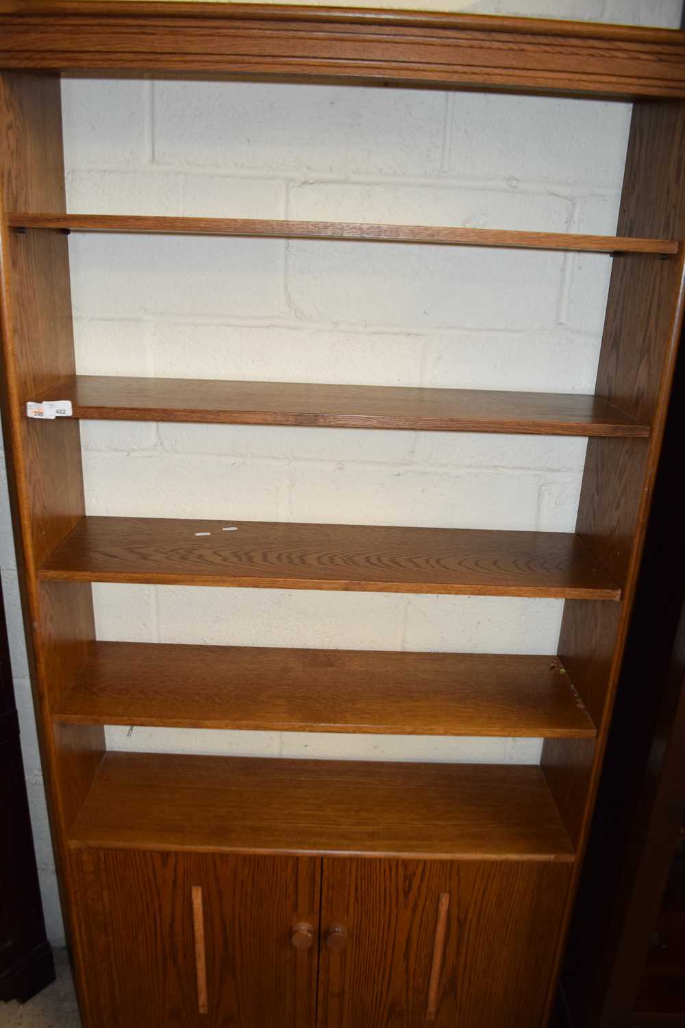 Lot 402 LIGHT OAK FINISH BOOKCASE WITH