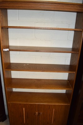 Lot 402 - LIGHT OAK FINISH BOOKCASE CABINET WITH...