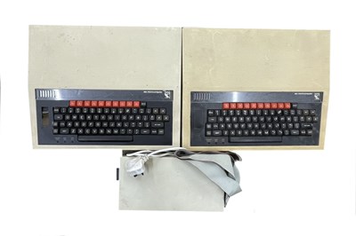 Lot 212 - A pair of 1980s BBC microcomputers, one with...