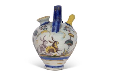 Lot 107 - Italian Maiolica syrup jar decorated with...
