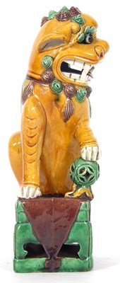 Lot 213 - Chinese mythical dragon or dog of fo in tang...