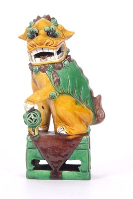 Lot 213 - Chinese mythical dragon or dog of fo in tang...