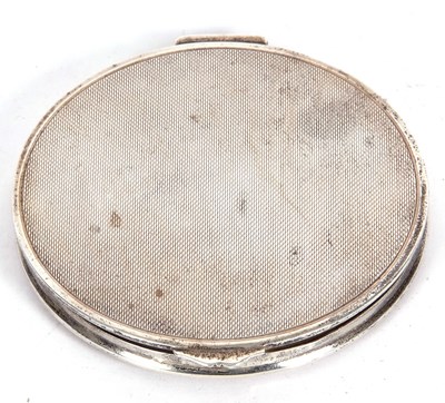 Lot 48 - A large George VI circular powder compact with...