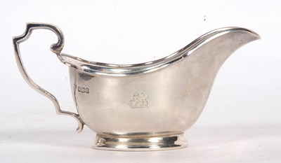 Lot 65 - George V sauce boat of usual form with applied...