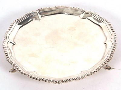 Lot 57 - Early George III waiter of shaped circular...