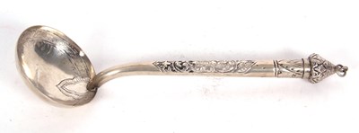 Lot 103 - North African white metal ladle with engraved...