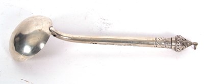 Lot 103 - North African white metal ladle with engraved...