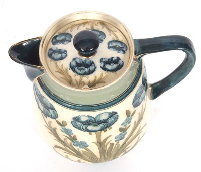 Lot 64 - MacIntyre Moorcroft Teapot and Stand