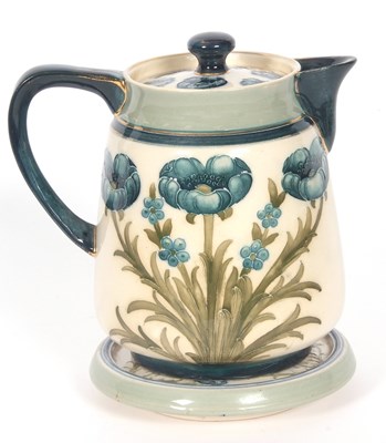 Lot 64 - MacIntyre Moorcroft Teapot and Stand