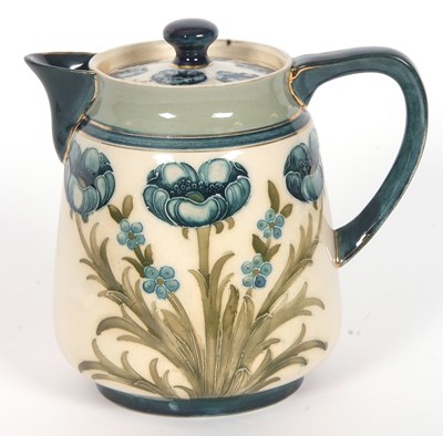 Lot 64 - MacIntyre Moorcroft Teapot and Stand