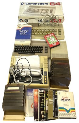 Lot 214 - A boxed Commodore 64 computer and accessories...