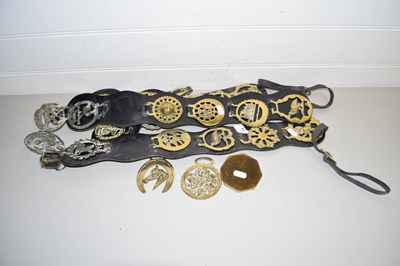 Lot 35 - Collection of various horse brasses on leather...