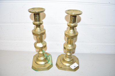 Lot 96 - Pair of brass candlesticks