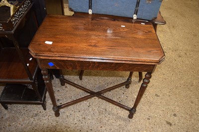 Lot 349 - Early 20th Century oak folding card table with...