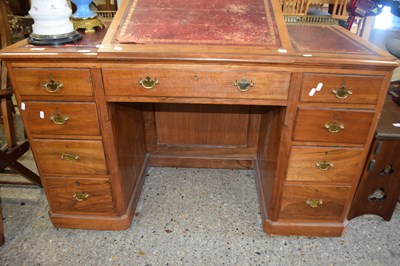 Lot 357 - Late  Victorian twin pedestal desk with red...