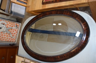 Lot 380 - Early 20th Century oval bevelled wall mirror