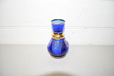Lot 117 - Small blue and gilt bohemian glass vase