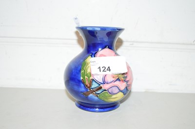 Lot 124 - Small Moorcroft ballister vase magnolia pattern