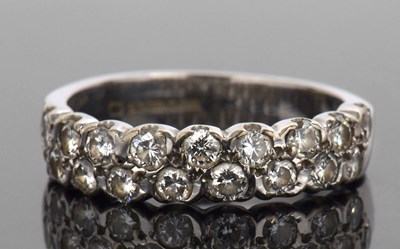 Lot 456 - 18ct white gold diamond half eternity ring...