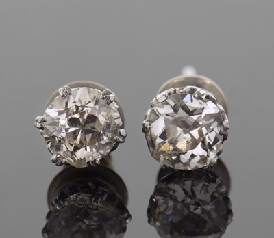 Lot 521 - Two Diamond stud earrings, two old cut...