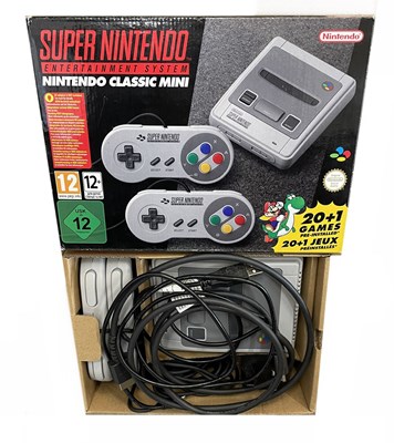 Lot 219 - A boxed Super Nintendo Entertainment System...