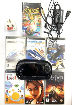 Lot 223 - A 2005 PSP handheld console in original...