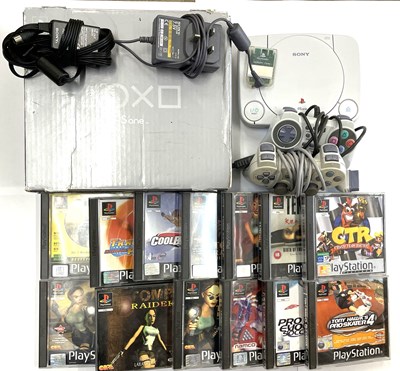 Lot 220 - A boxed Sony Playstation PS1 console, with 2...