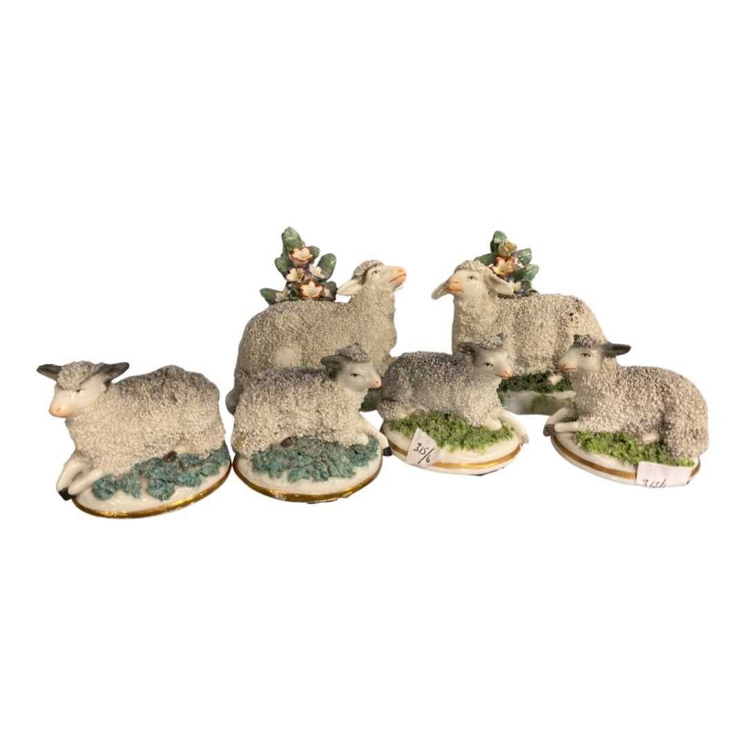 Lot 425 - Set of six porcelain models of sheep, late...