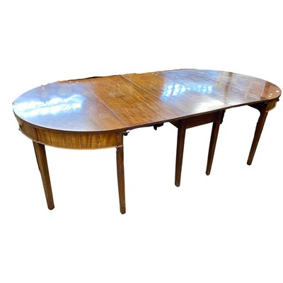 Lot 637 - George III mahogany D end dining table formed...