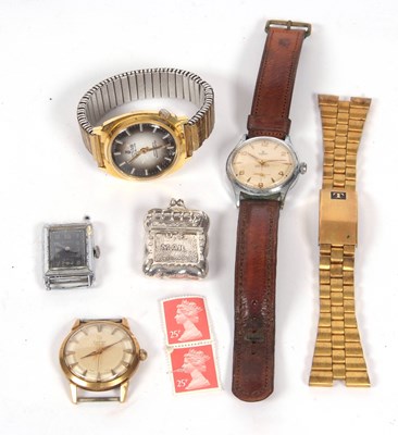 Lot 298 - A mixed lot of four wristwatches and a metal...