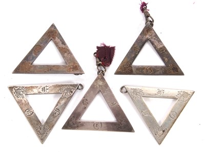 Lot 194 - Group of five Masonic triangular pendants,...