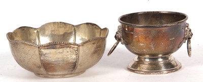 Lot 228 - A small silver bowl in the form of a punch...