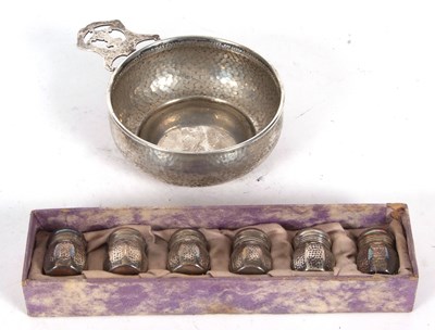 Lot 249 - Sterling marked spot hammered porringer...