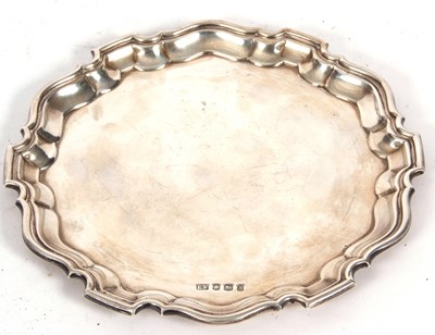 Lot 252 - Hallmarked silver card salver of plain design...