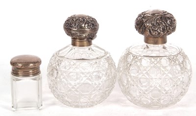 Lot 256 - Large cut glass scent bottle of globular form...