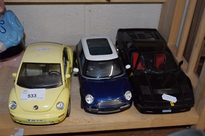 Lot 533 - Three model cars to include Burago