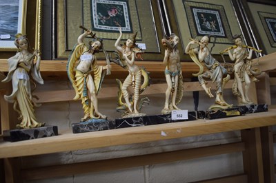 Lot 552 - Six modern resin figures with marble bases