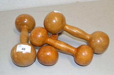 Lot 48 - Four wooden dumbells
