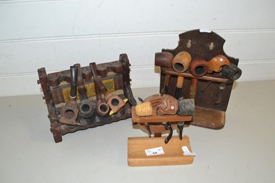Lot 64 - Three stands, various tobacco pipes